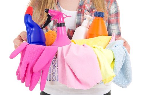 Professional cleaner preparing a spotless living space in Kingston