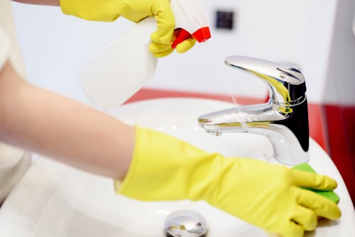 Staff following safe cleaning procedures