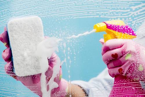 Close-up of fabric upholstery stain removal during sofa cleaning
