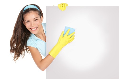 Kingston cleaning professional working on a well-maintained room